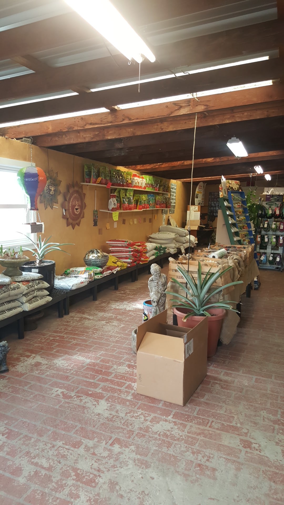 Inside the Ozark Nursery shop with pots and decor